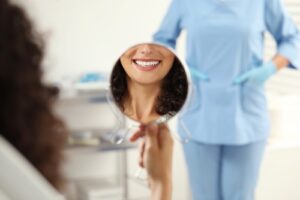 Patient,Looking,In,Mirror,And,Doctor,In,Clinic